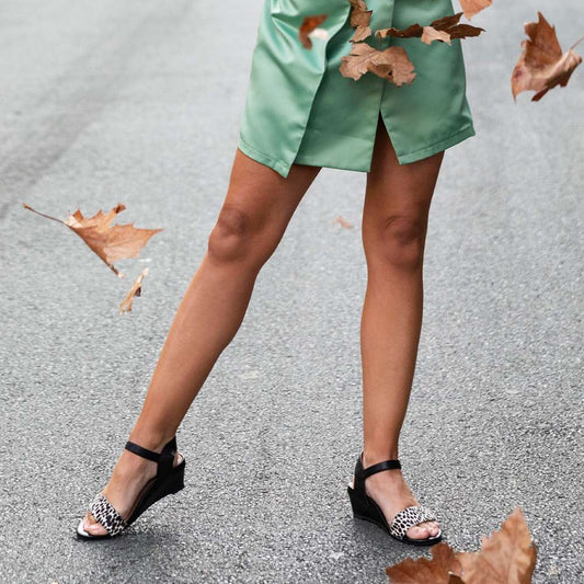 Lifestyle image for Nelly Wedge Sandal - Black Ocelot