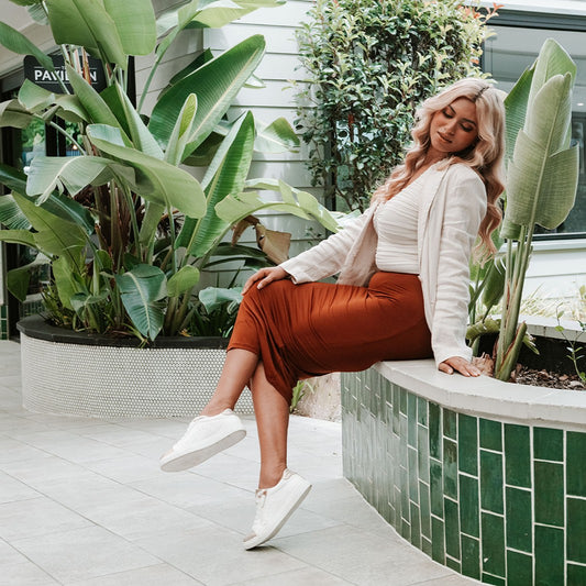 Lifestyle image for Cleo Zip Casual Sneaker - White/Gold